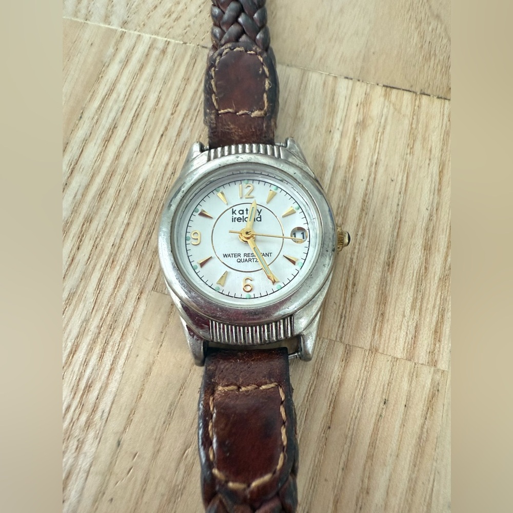 Vintage Kathy Ireland ladies silver tone brown braided leather watch NEW BATTERY